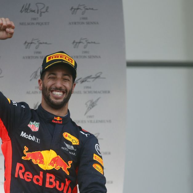 Daniel Ricciardo奪下本季首勝後露出開心的笑容。（達志影像）