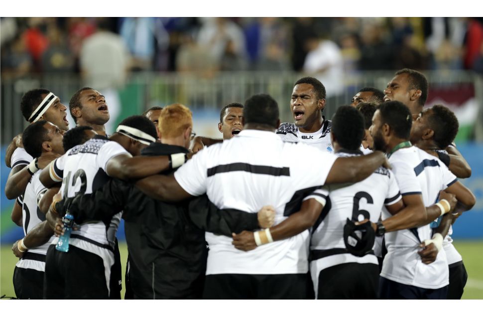 斐濟七人制橄欖球隊奪下該國奧運史上首金。(達志影像)