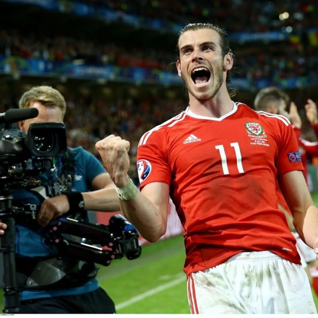 Gareth Bale歡慶威爾斯晉級4強。（達志影像）